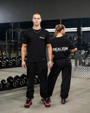 REALISM X DERRIMUT GYM CLASSIC TEE BLACK